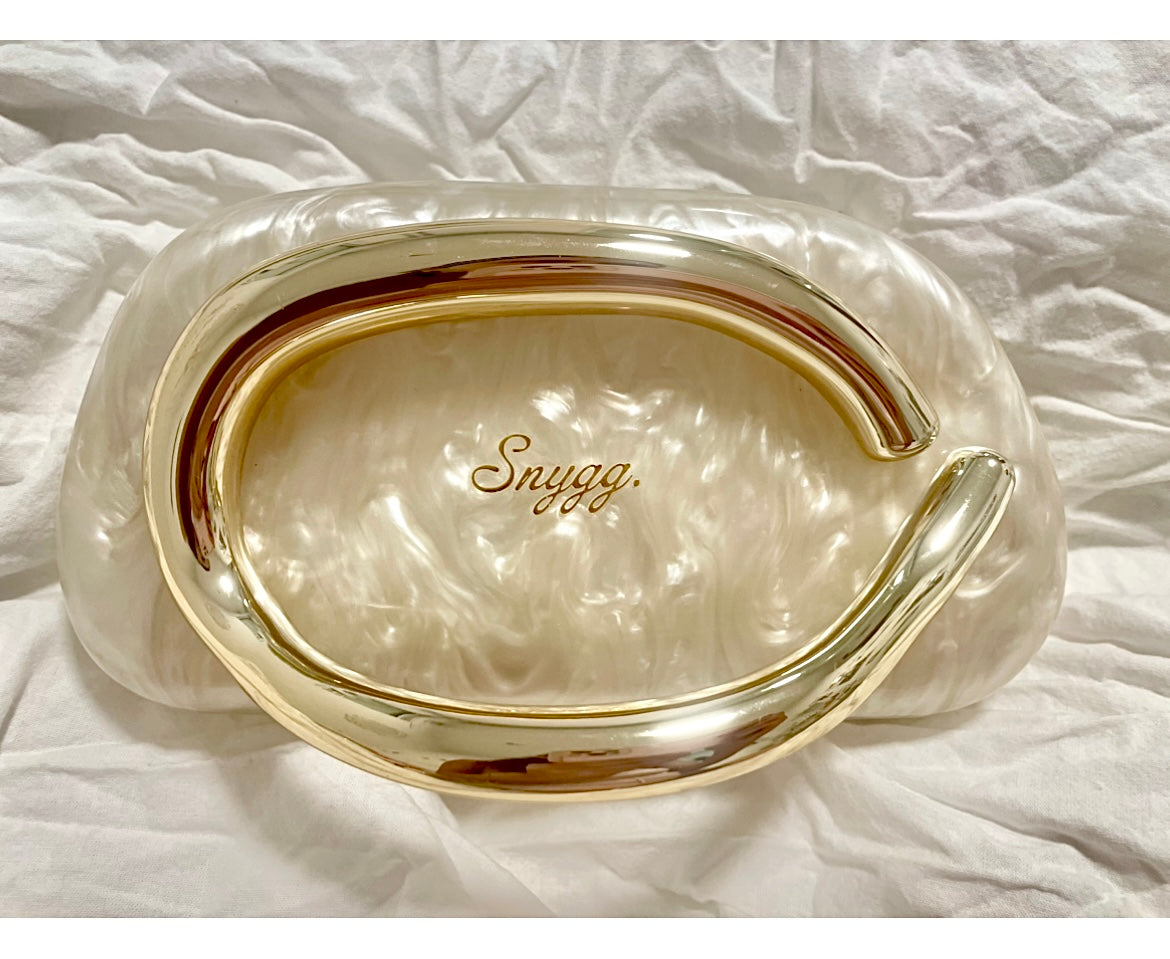 The golden Monaco clutch bag