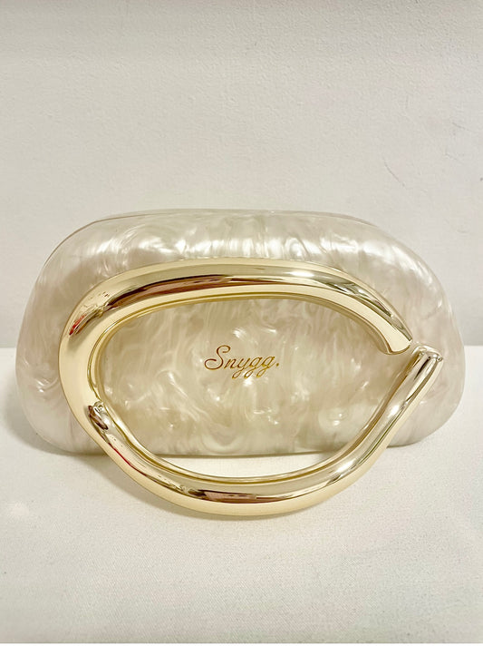 The golden Monaco clutch bag