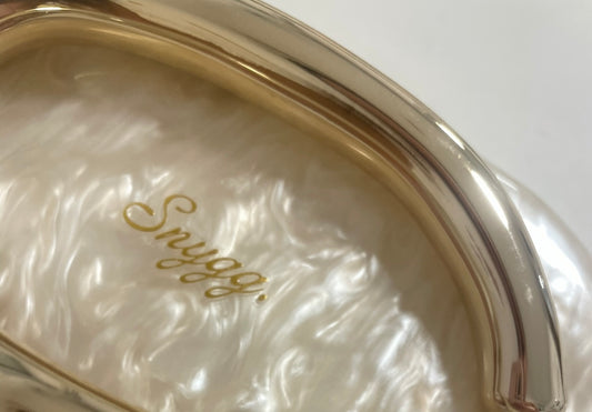 The golden Monaco clutch bag